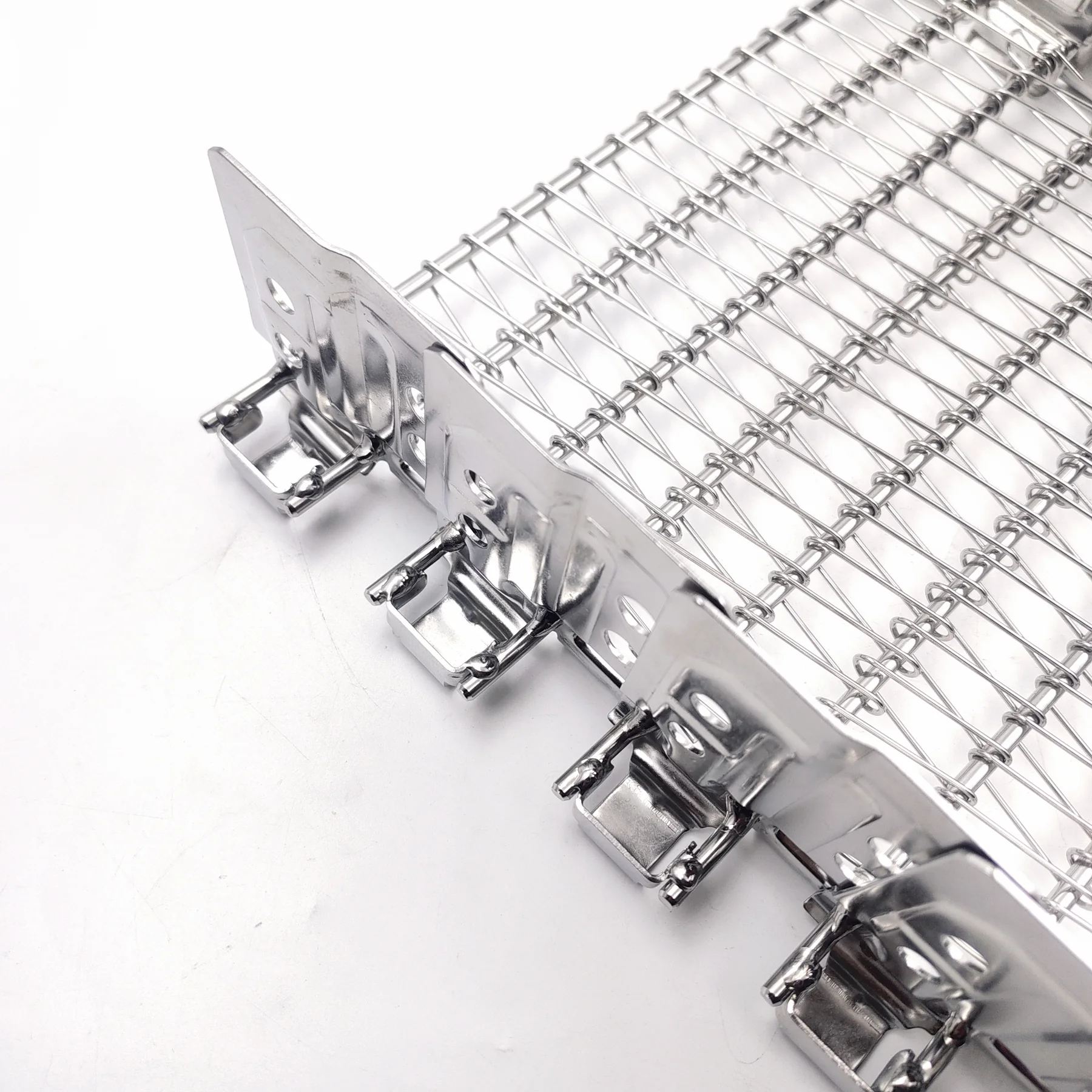 Self-stacker belt slot and engagement detail